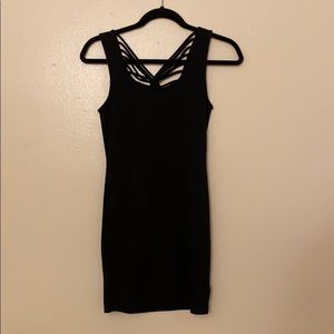Black fitted dress with detail in the back